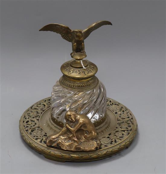A glass and brass inkstand with eagle finial together with a paperweight